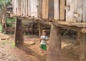 The foundation of this house in Laos is recycled ordinance.