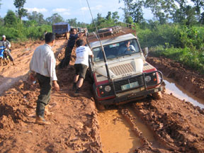Truck bogged down in muddy road